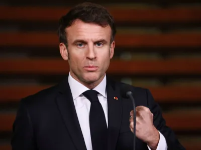 French President Emmanuel Macron reacts, at a joint news conference held with Dutch Prime Minister Mark Rutte, in The Hague, Netherlands January 30, 2023. REUTERS/Yves Herman