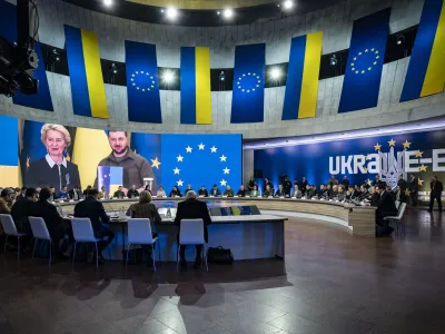 European Commission President Ursula von der Leyen and Ukrainian President Volodymyr Zelenskyy is seen on a screen during the EU-Ukraine summit in Kyiv, Ukraine, Thursday, Feb. 2, 2023. (Ukrainian Presidential Press Office via AP)