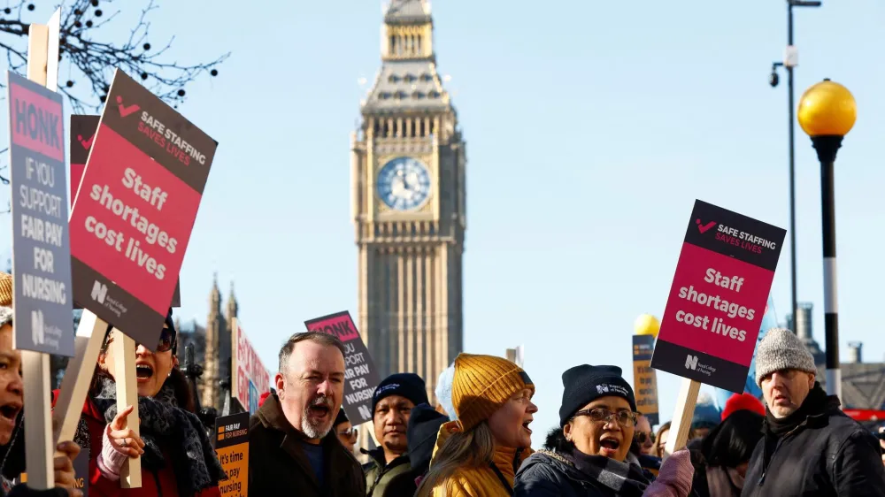 Nurses protest during a strike by NHS medical workers, amid a dispute with the government over pay, outside St Thomas' Hospital, in London, Britain, February 6, 2023. REUTERS/Peter Nicholls