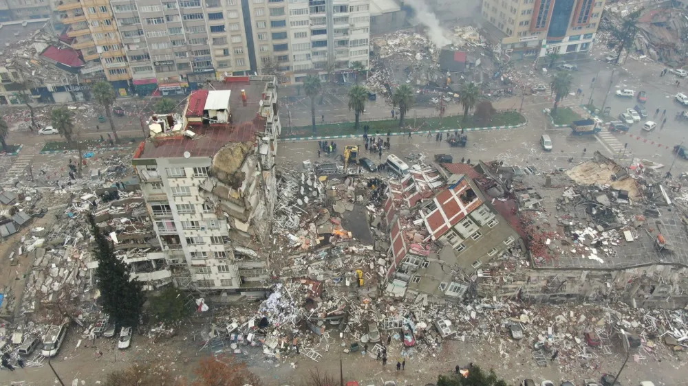 A general view shows damaged and collapsed buildings after an earthquake in Kahramanmaras, Turkey February 6, 2023. Ihlas News Agency (IHA) via REUTERS ATTENTION EDITORS - THIS PICTURE WAS PROVIDED BY A THIRD PARTY. NO RESALES. NO ARCHIVES. TURKEY OUT. NO COMMERCIAL OR EDITORIAL SALES IN TURKEY.