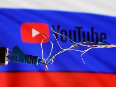 Broken Ethernet cable is seen in front of Russian flag and Youtube logo in this illustration taken March 11, 2022. REUTERS/Dado Ruvic/Illustration