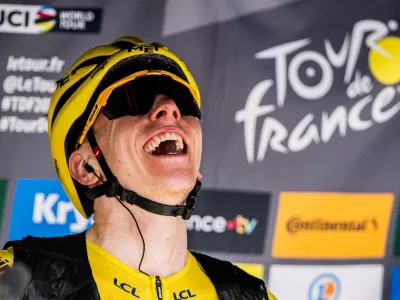 14 July 2024, France, Plateau de Beille: Slovenian cyclist Tadej Pogacar of UAE Team Emirates celebrates winning stage 15 of the 2024 Tour de France cycling race, 107,7 km from Loudenvielle to Plateau de Beille. Photo: Jasper Jacobs/Belga/dpa