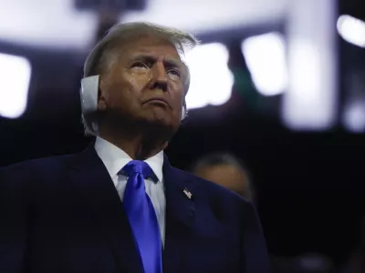 Republican presidential nominee and former U.S. President Donald Trump looks on during Day 2 of the Republican National Convention (RNC), at the Fiserv Forum in Milwaukee, Wisconsin, U.S., July 16, 2024. REUTERS/Evelyn Hockstein