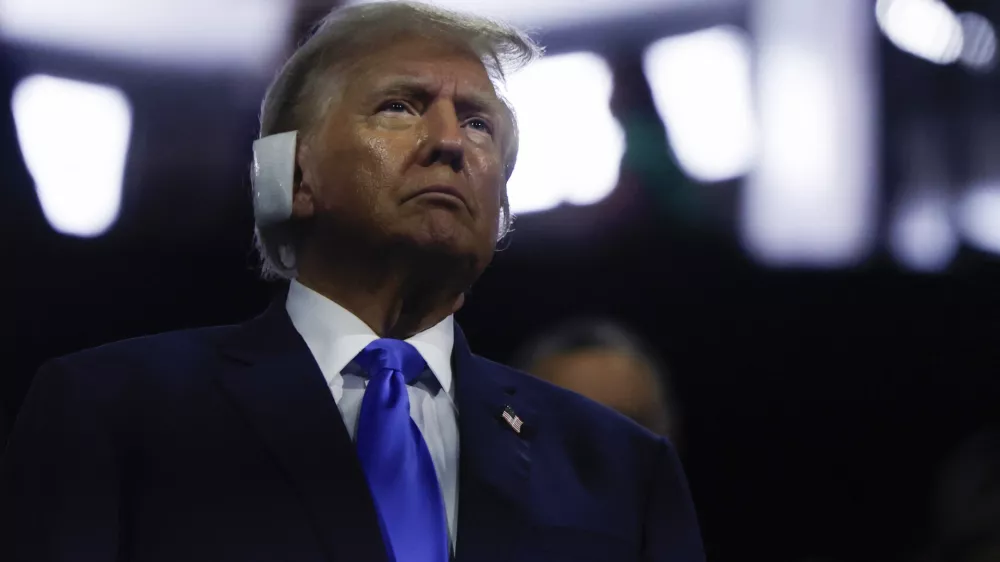 Republican presidential nominee and former U.S. President Donald Trump looks on during Day 2 of the Republican National Convention (RNC), at the Fiserv Forum in Milwaukee, Wisconsin, U.S., July 16, 2024. REUTERS/Evelyn Hockstein