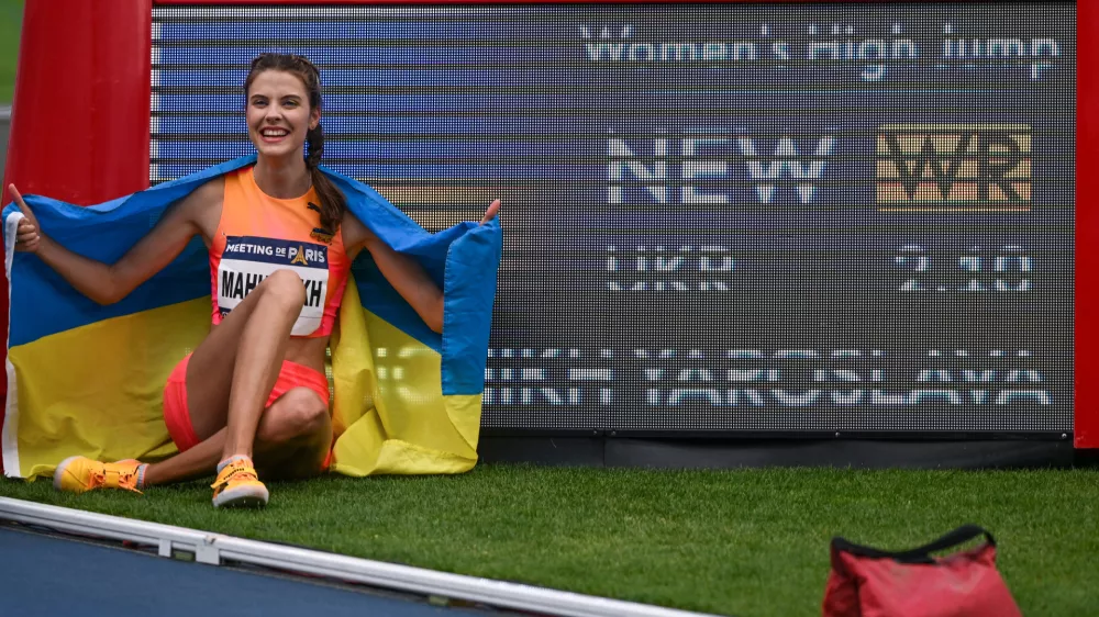 PARIS, FRANCE - JULY 08:Yaroslava MAHUCHIKH of Ukraine celebrates after winning the Women's High Jump and achieving a 2.10m performance, a new World Record, during the Meeting of Paris 2024 - IAAF Diamond League, on July 08, 2024, at Charlety Stadium, Paris, France. (Photo by Artur Widak/NurPhoto)NO USE FRANCE