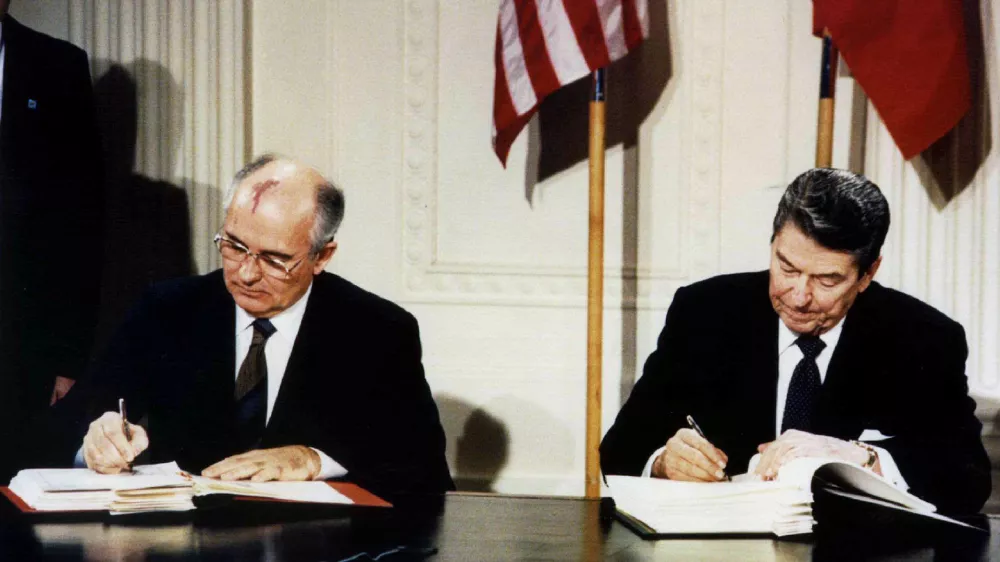 ﻿FILE PHOTO: U.S. President Ronald Reagan (R) and Soviet President Mikhail Gorbachev sign the Intermediate-Range Nuclear Forces (INF) treaty in the White House December 8 1987. REUTERS//File Photo