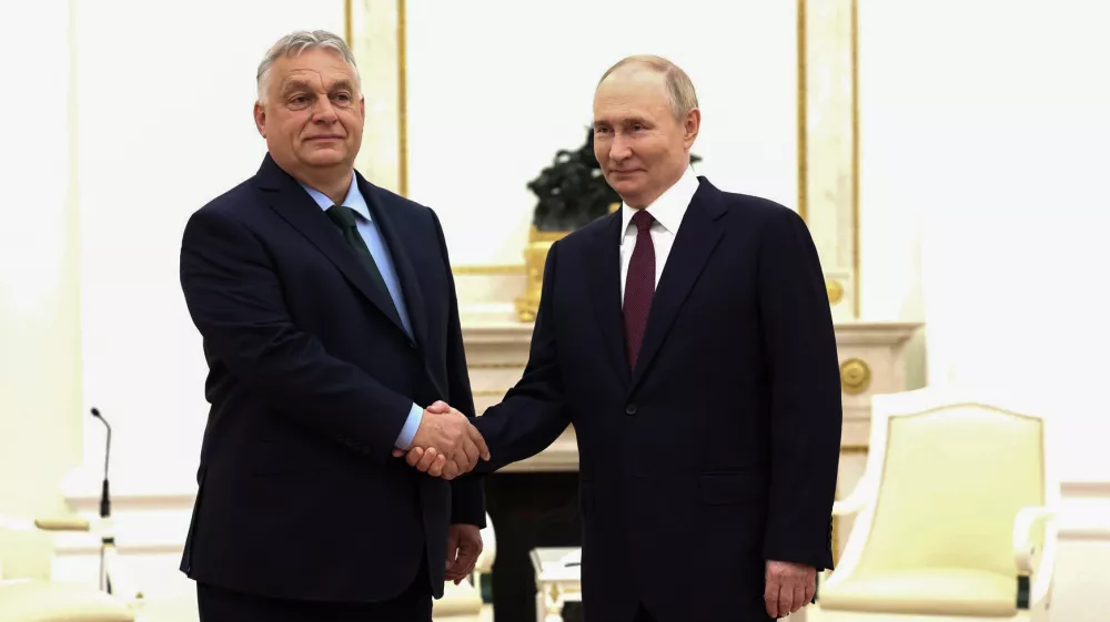 FILED - 05 July 2024, Russia, Moscow: Russian President Vladimir Putin (R) shakes hands with Hungary's Prime Minister Viktor Orban during their meeting in Moscow. Photo: -/Kremlin/dpa - ATTENTION: editorial use only and only if the credit mentioned above is referenced in full