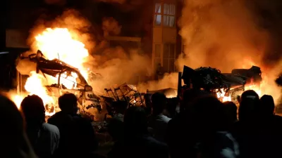 Fires burn during unrest in Harehills, Leeds, Britain, July 18, 2024 in this still image obtained from social media video. ?@robin_singh? via Instagram/via REUTERS THIS IMAGE HAS BEEN SUPPLIED BY A THIRD PARTY. MANDATORY CREDIT.