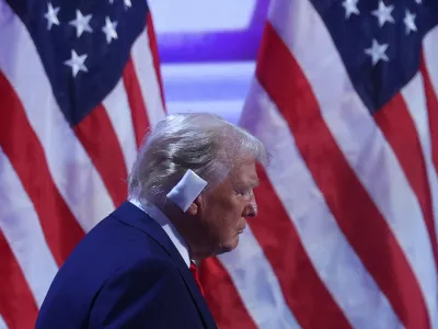 Republican presidential nominee and former U.S. President Donald Trump takes the stage to speak on Day 4 of the Republican National Convention (RNC), at the Fiserv Forum in Milwaukee, Wisconsin, U.S., July 18, 2024. REUTERS/Brian Snyder