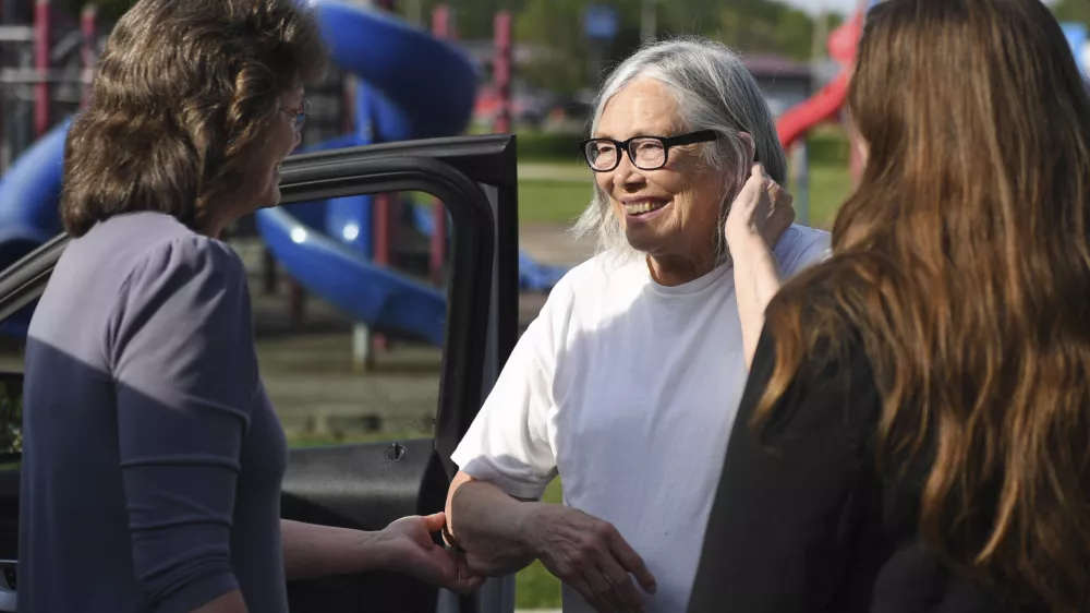 Sandra Hemme, center, meets with family and supporters after she was released from Chillicothe Correctional Center, Friday, July 19, 2024, in Chillicothe, Miss. Hemme's murder conviction was overturned after she served 43 years in prison, despite objections from Missouri's attorney general. (HG Biggs/The Kansas City Star via AP)