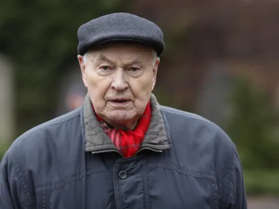 FILE - Hans Modrow, the last Communist Prime Minister of former East Germany, German Democratic Republic, attends a commemoration for former German socialists' leaders Rosa Luxemburg and Karl Liebknecht at a cemetery in Berlin, Jan. 13, 2019. Hans Modrow, East Germany's leader during a turbulent tenure that ended in the country's first and only free election, has died. He was 95. (AP Photo/Markus Schreiber, File)