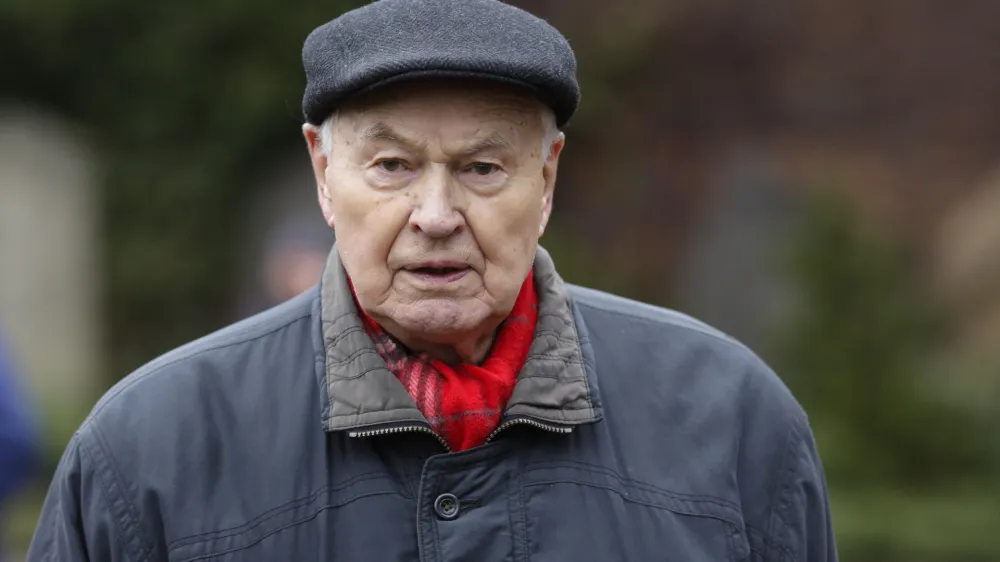 FILE - Hans Modrow, the last Communist Prime Minister of former East Germany, German Democratic Republic, attends a commemoration for former German socialists' leaders Rosa Luxemburg and Karl Liebknecht at a cemetery in Berlin, Jan. 13, 2019. Hans Modrow, East Germany's leader during a turbulent tenure that ended in the country's first and only free election, has died. He was 95. (AP Photo/Markus Schreiber, File)