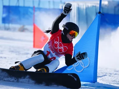 ﻿2022 Beijing Olympics - Snowboard - Women's Parallel Giant Slalom Quarterfinals - Genting Snow Park, Zhangjiakou, China - February 8, 2022. Gloria Kotnik of Slovenia in action. REUTERS/Dylan Martinez