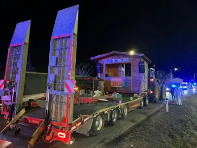 18 February 2023, Austria, Reisenberg: Emergency perssonel work at the site where a parade float had overturned in a bend and injured 15 people during a carnival procession in Reisenberg. Photo: Monatsrevue/Thomas Lenger/APA/dpa