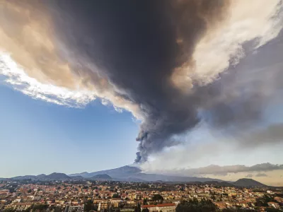 ﻿Volcanic ashes ascend from the southeastern crater of the Mt. Etna volcano as seen from Pedara, Sicily, Italy, Monday, Feb. 21, 2022. The second-strongest paroxysm of 2022 produced volcanic smoke and ashes that rose for 10 kilometers (6.2 miles) forcing the temporary closure of the nearby Vincenzo Bellini international airport in Catania. (AP Photo/Salvatore Allegra)