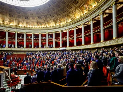 Far-left members of the parliament leave as the rest of the members of parliament sing the national anthem, while the debate on the pension reform plan has been closed at the National Assembly in Paris, France February 17, 2023. REUTERS/Sarah Meyssonnier