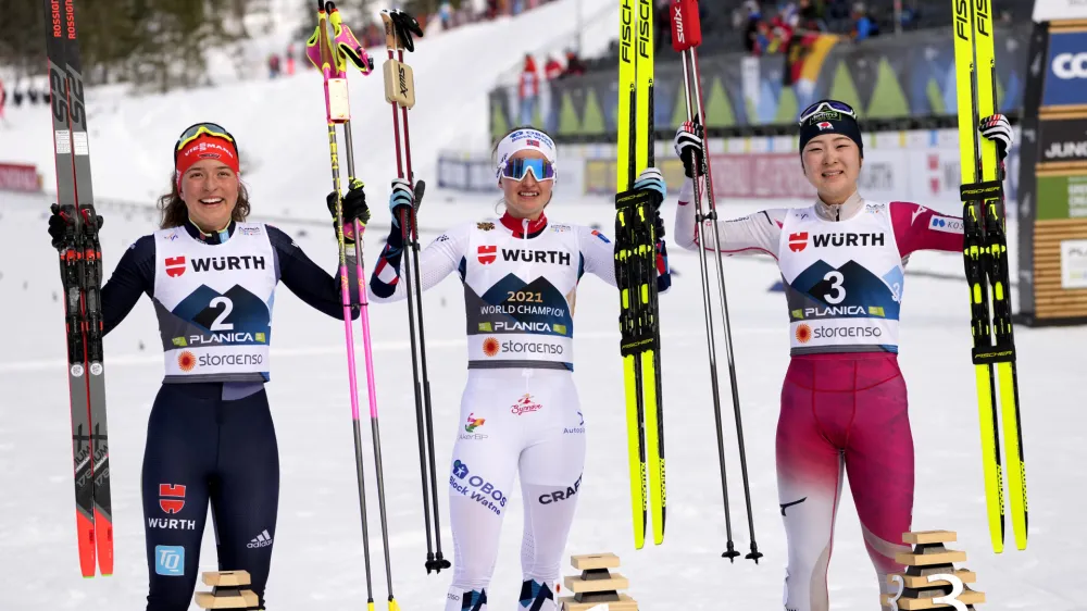 First place, Norway's Gyda Hansen Westvold, center, poses with second place, Germany's Nathalie Armbruster, left, and third place, Japan's Haruka Kasai during the Women's Nordic Combined Gundersen Normal Hill HS100/5km at the Nordic World Ski Championships in Planica, Slovenia, Friday, Feb. 24, 2023. (AP Photo/Darko Bandic)