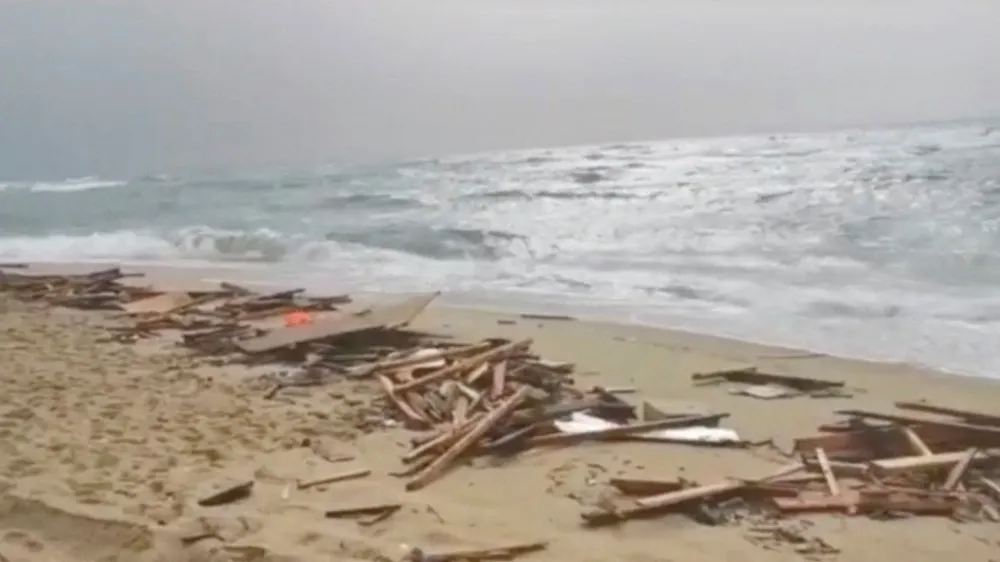 A screengrab taken from a video shows the beach where bodies of suspected to be refugees were found after a shipwreck, in Cutro, the eastern coast of Italy's Calabria region, Italy, February 26, 2023. Italian Police/Handout via REUTERS ATTENTION EDITORS - THIS PICTURE WAS PROVIDED BY A THIRD PARTY. MANDATORY CREDIT.