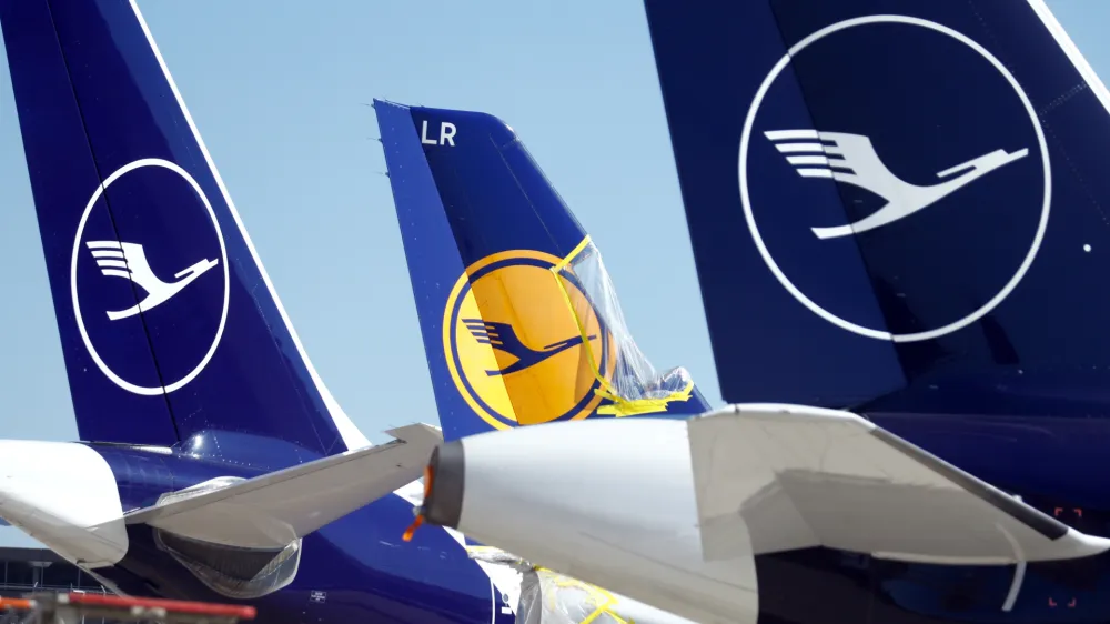 ﻿FILE PHOTO: Aircraft of the German carrier Lufthansa are parked on the tarmac, as the spread of the coronavirus disease (COVID-19) continues, at the airport in Frankfurt, Germany March 24, 2020. REUTERS/Ralph Orlowski/File Photo