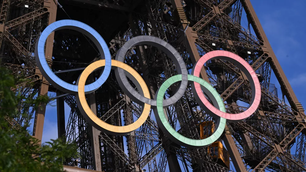 23 July 2024, France, Paris: The Olympic Rings are seen on the Eiffel tower ahead of the 2024 Paris Summer Olympic Games at in Paris. Photo: Dave Hunt/AAP/dpa