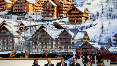 French President Emmanuel Macron, third right, and French officials attend France's bid to host the 2030 Winter Games during the 142nd IOC session at the 2024 Summer Olympics, Wednesday, July 24, 2024, in Paris, France. (AP Photo/Natacha Pisarenko)