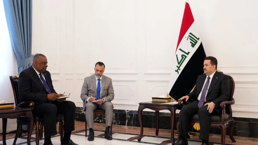 Iraqi Prime Minister Mohammed Shia al-Sudani meets with U.S. Defense Secretary Lloyd Austin?in Baghdad,Iraq,March 7, 2023. Iraqi Prime Minister Media Office/Handout via REUTERS ATTENTION EDITORS - THIS IMAGE WAS PROVIDED BY A THIRD PARTY.