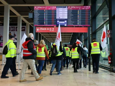 Airport workers protest at BER airport during a strike called by the German trade union Verdi in Berlin, March 13, 2023. REUTERS/Christian Mang