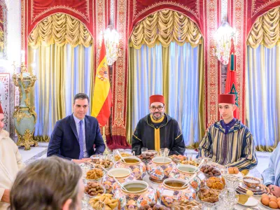 In this photo provided by the Royal Palace, Moroccan King Mohammed VI, center, Spain's Prime Minister Pedro Sanchez, second left, Crown Prince Moulay Hassan, second right, Prince Moulay Rachid, the king's brother, right, and Morocco's Prime Minister Aziz Akhannouch, left, pose before an Iftar meal, the evening meal when Muslims end their daily Ramadan fast at sunset, at the King Royal residence in Sale, Morocco, Thursday, April 7, 2022. Sanchez is on a two-day visit to Morocco that promises to mark an easing of diplomatic tensions centered on Morocco's disputed region of Western Sahara. (Moroccan Royal Palace via AP)