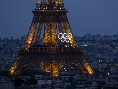 24 July 2024, France, Paris: The Olympic Rings are seen on the Eiffel tower ahead of the 2024 Paris Summer Olympic Games at in Paris. Photo: Deml Ondřej/CTK/dpa