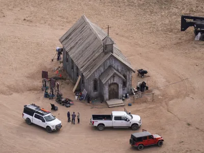 FILE - This aerial photo shows the movie set of "Rust" at Bonanza Creek Ranch in Santa Fe, N.M., on Saturday, Oct. 23, 2021. A judge is scheduled to resolve a weapons-related charge against a codefendant in the case against Alec Baldwin in the fatal shooting of a cinematographer during a 2021 movie rehearsal. Prosecutors have proposed plea agreement with safety coordinator and assistant director David Halls regarding his involvement in the western movie "Rust" and the death of cinematographer Halyna Hutchins. (AP Photo/Jae C. Hong, File)