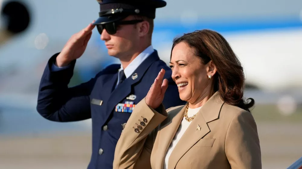 U.S. Vice President Kamala Harris salutes upon arrival at Joint Base Andrews in Maryland, July 27, 2024. Stephanie Scarbrough/Pool via REUTERS