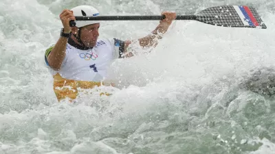 Benjamin Savsek of Slovenia competes in the men's canoe single heats during the canoe slalom at the 2024 Summer Olympics, Saturday, July 27, 2024, in Vaires-sur-Marne, France. (AP Photo/Kirsty Wigglesworth)