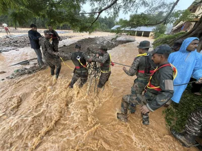 This photograph provided by PRO Defense Kochi shows Indian army soldiers engaged in rescue operations at landslide affected village in Wayanad in southern Kerala, India, Tuesday, July 30, 2024. (PRO Defense Kochi via AP)