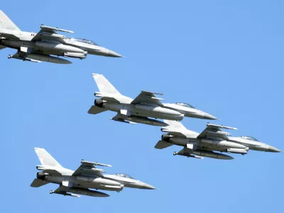 FILE - U.S. made F-16 fighter jets fly in the sky over Poland's capital as they take part in a massive military parade to celebrate the Polish Army Day, in Warsaw, Poland, Aug. 15, 2023. Ukraine has received the first tranche of western F-16 fighter jets that it has sought for months to be able to fight back against an onslaught of Russian missile strikes, a U.S. official confirmed to the Associated Press. Ukraine has been pushing to get Western F-16s for Ukraine for months, saying they were critically needed to fight back against the onslaught of missiles Russia has fired against them. (AP Photo/Czarek Sokolowski, File)