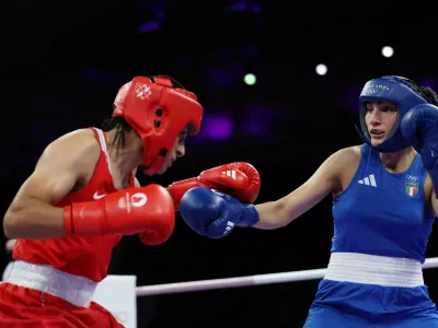 Paris 2024 Olympics - Boxing - Women's 66kg - Prelims - Round of 16 - North Paris Arena, Villepinte, France - August 01, 2024. Imane Khelif of Algeria and Angela Carini of Italy in action. REUTERS/Isabel Infantes