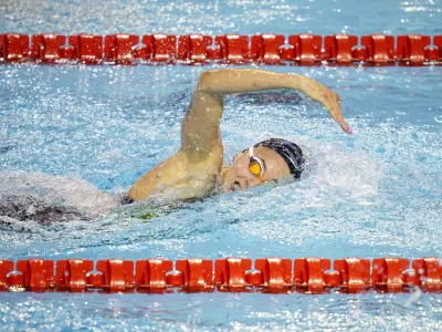 Slovenia's Neza Klancar competes during the first heat of the Women's 100m Individual Medley at the LEN European Short Course Swimming Championships in Otopeni, Romania, Wednesday, Dec. 6, 2023. (AP Photo/Andreea Alexandru)