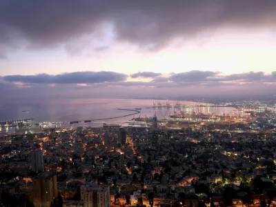 The sun rises, amid the ongoing conflict in Gaza between Israel and Hamas, over Haifa, northern Israel, August 1, 2024. REUTERS/Ammar Awad