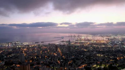 The sun rises, amid the ongoing conflict in Gaza between Israel and Hamas, over Haifa, northern Israel, August 1, 2024. REUTERS/Ammar Awad