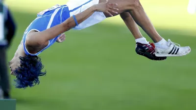 Gianmarco Tamberi of Italy performs a somersault during the men's high jump final at the European Athletics Championships in Helsinki June 29, 2012.  REUTERS/Yves Herman (FINLAND - Tags: SPORT ATHLETICS)