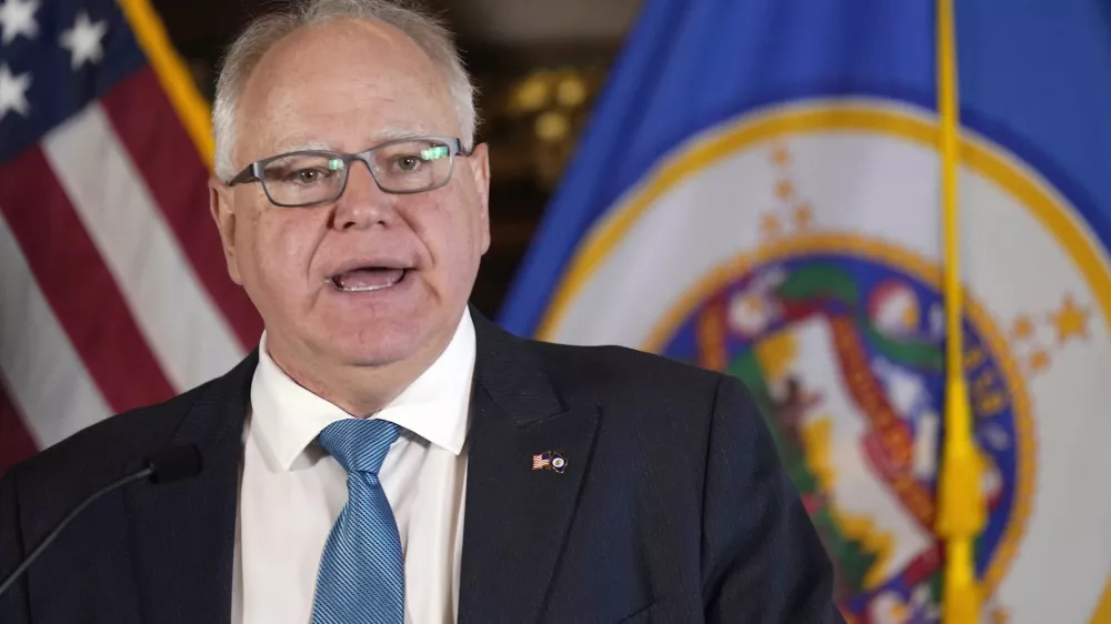 FILE - Minnesota Gov. Tim Walz speaks to the media, Nov. 9, 2022, in St. Paul, Minn. (AP Photo/Abbie Parr, File)