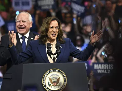 06 August 2024, US, Philadelphia: US Vice President and 2024 Democratic presidential candidate Kamala Harris and her running mate, Govenor Tim Walz speak at Temple University's Liacouras Center in Philadelphia, during a campaign rally. Photo: Ricky Fitchett/ZUMA Press Wire/dpa