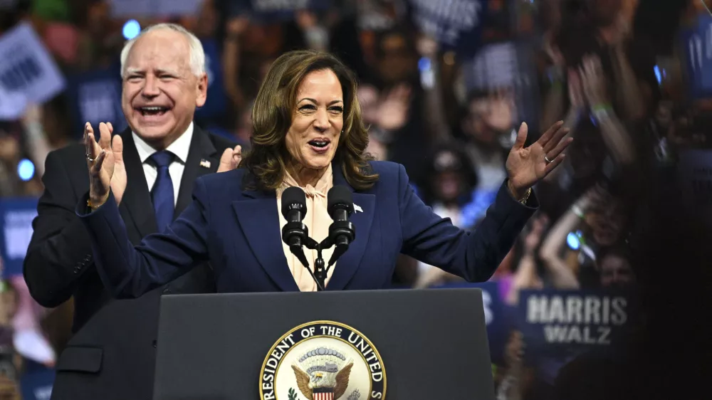 06 August 2024, US, Philadelphia: US Vice President and 2024 Democratic presidential candidate Kamala Harris and her running mate, Govenor Tim Walz speak at Temple University's Liacouras Center in Philadelphia, during a campaign rally. Photo: Ricky Fitchett/ZUMA Press Wire/dpa