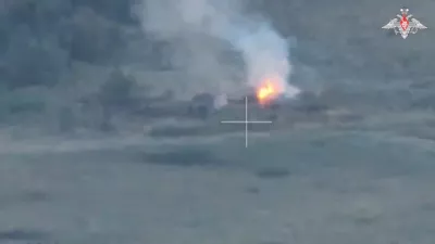 An aerial view shows what is said to be a Russian army strike on Ukrainian ammunition concealed in the area bordering Ukraine in the Kursk Region, Russia, in this still image from video released August 8, 2024. Russian Defence Ministry/Handout via REUTERS ATTENTION EDITORS - THIS IMAGE HAS BEEN SUPPLIED BY A THIRD PARTY. NO RESALES. NO ARCHIVES. MANDATORY CREDIT. WATERMARK FROM SOURCE.