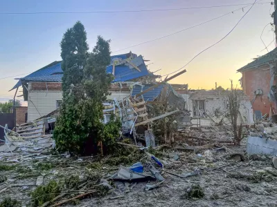 This photo released by the acting Governor of Kursk region Alexei Smirnov telegram channel on Tuesday, Aug. 6, 2024, shows a damaged house after shelling by the Ukrainian side in the city of Sudzha, Kursk region that borders Ukraine. Russian officials said Wednesday they were fighting off Ukrainian cross-border raids in a southwestern border province for a second day, as Kyiv officials remained quiet about the scope of the operation. (Governor of Kursk region telegram channel via AP)