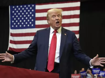 Republican presidential nominee former President Donald Trump arrives to speak at a campaign rally in Bozeman, Mont., Friday, Aug. 9, 2024. (AP Photo/Rick Bowmer)