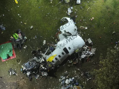 The debris at the site where an airplane crashed with 61 people on board, in Vinhedo, Sao Paulo state, Brazil, early on Saturday, Aug. 10, 2024. Brazilian authorities are working to piece together what exactly caused the plane crash in Sao Paulo state the previous day, killing all 61 people aboard. (AP Photo/Andre Penner)