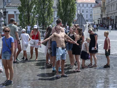 - 10.07.2024 - Ljubljana - vročina, vročinski val, pripeka, hlajenje, turisti //FOTO: Jaka Gasar