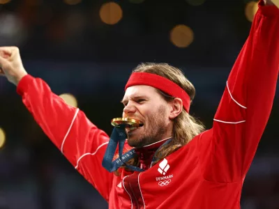 Danski rokometaš Mikkel Hansen se je veselil že druge zlate kolajne na olimpijskih igrah. Foto:  Reuters