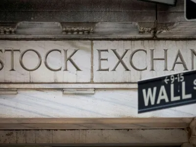 FILE PHOTO: The Wall Street entrance to the New York Stock Exchange (NYSE) is seen in New York City, U.S., November 15, 2022. REUTERS/Brendan McDermid//File Photo