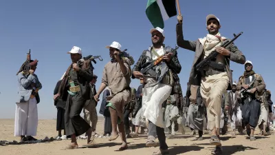 File - Houthi rebel fighters march during a rally of support for the Palestinians in the Gaza Strip and against the U.S. strikes on Yemen outside Sanaa on Jan. 22, 2024. (AP Photo, File)